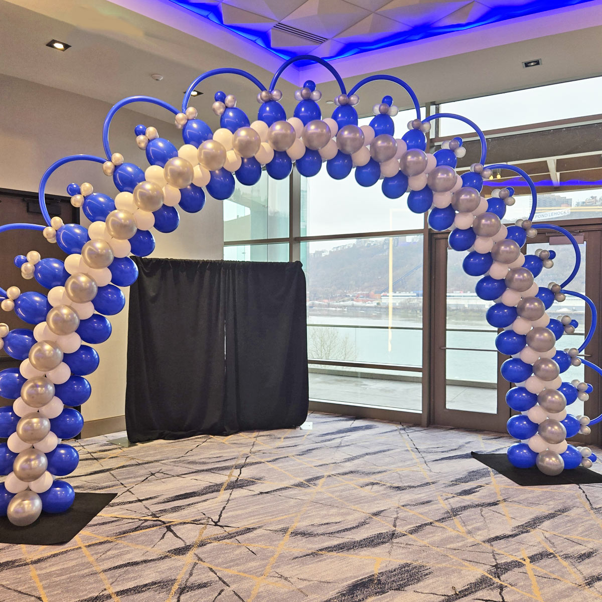 Blue-Peacock-Arch-by-Airheads-Balloon-Art Peacock specialty arch at Rivers Casino for corporate event<br />